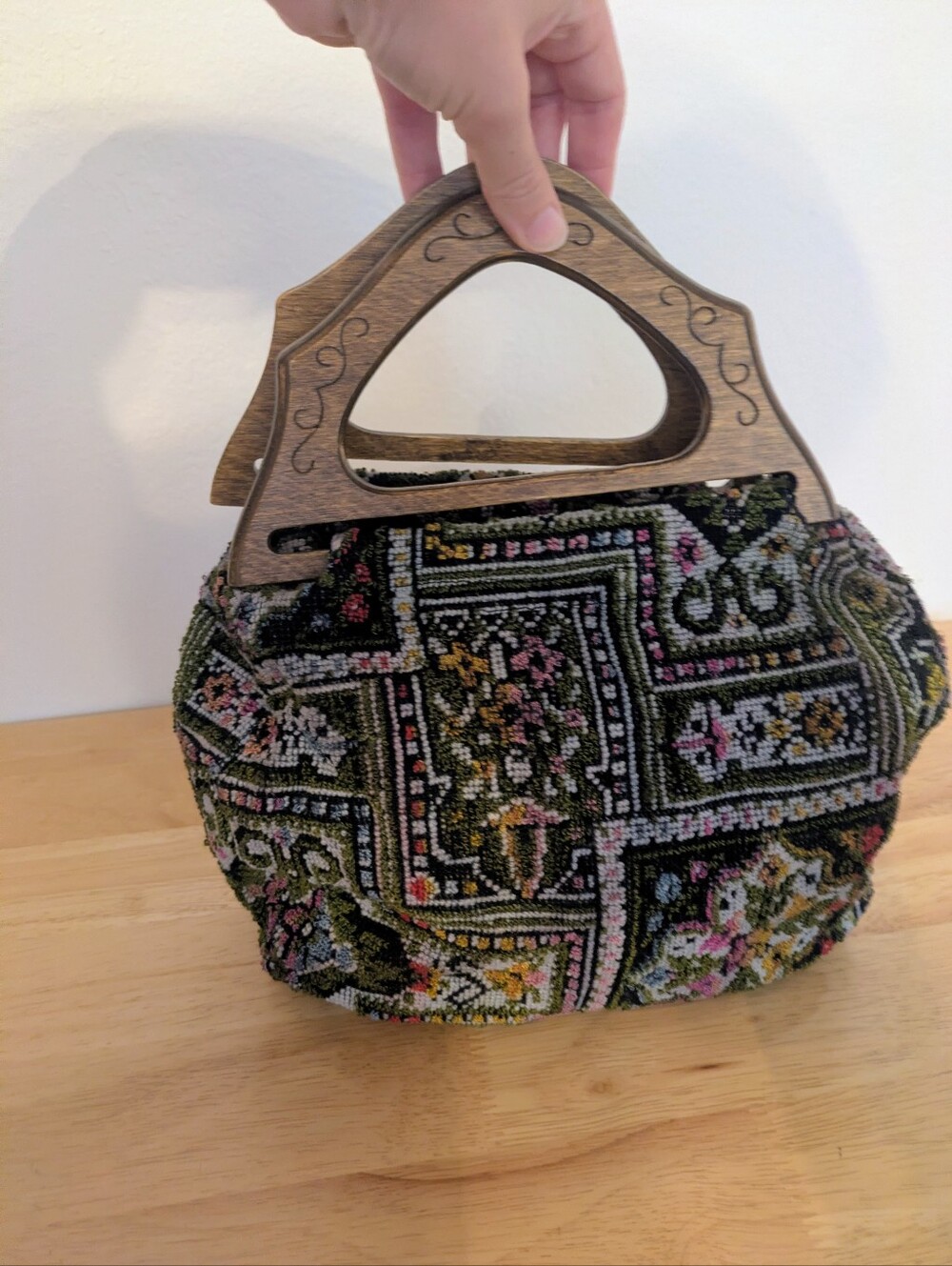 Vintage Multi pattern needlepoint tapestry handbag with carved wooden handle